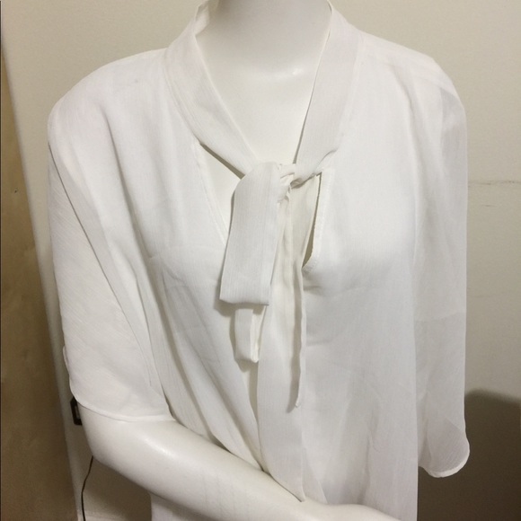 AGB® Plus Size Popover Tie Neck Top
Color: Cream - Picture 4 of 7